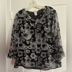 Black and white sheer blouse with lining.